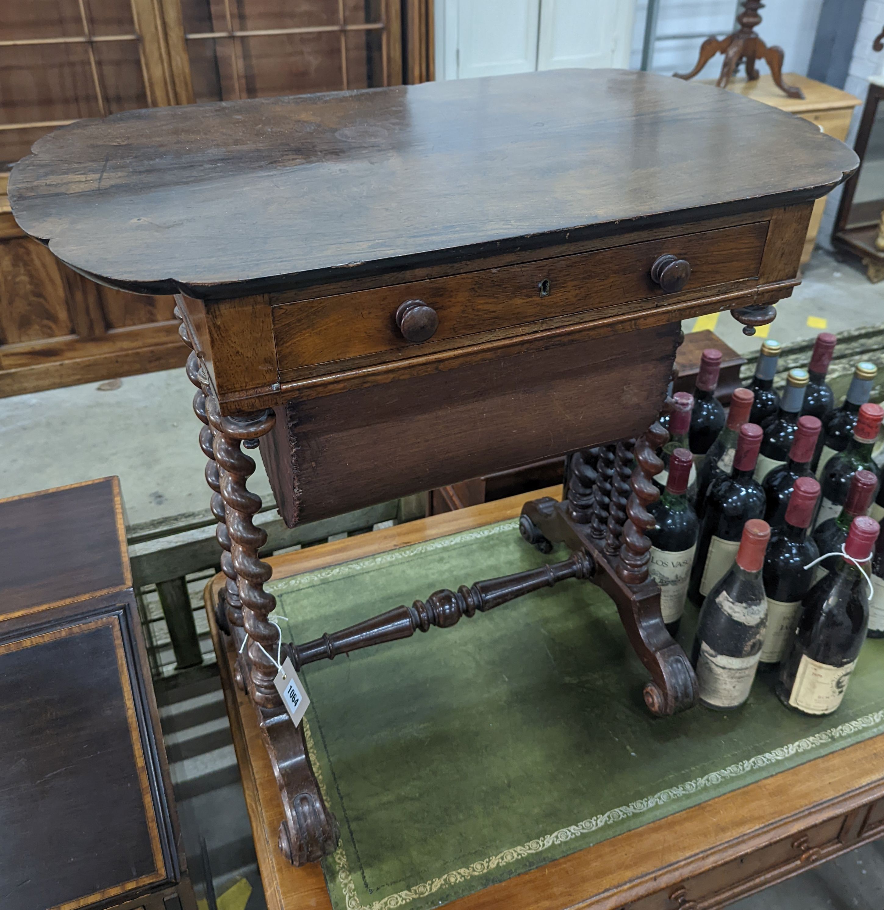 A 19th century Continental rosewood work table on spiral turned supports width 73cm, depth 45cm, height 71cm